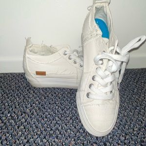 Blowfish wedged sneakers! Gives you a good 1inch lift!